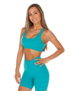 Elite Eleven Cross Over Sports Bra - Teal 8 Elite Eleven Cross Over Sports Bra - Teal -Elite Eleven CROSS.SUM .1 6of197
