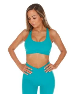 Elite Eleven Cross Over Sports Bra - Teal 9 Elite Eleven Cross Over Sports Bra - Teal -Elite Eleven CROSS.SUM .1 8of197